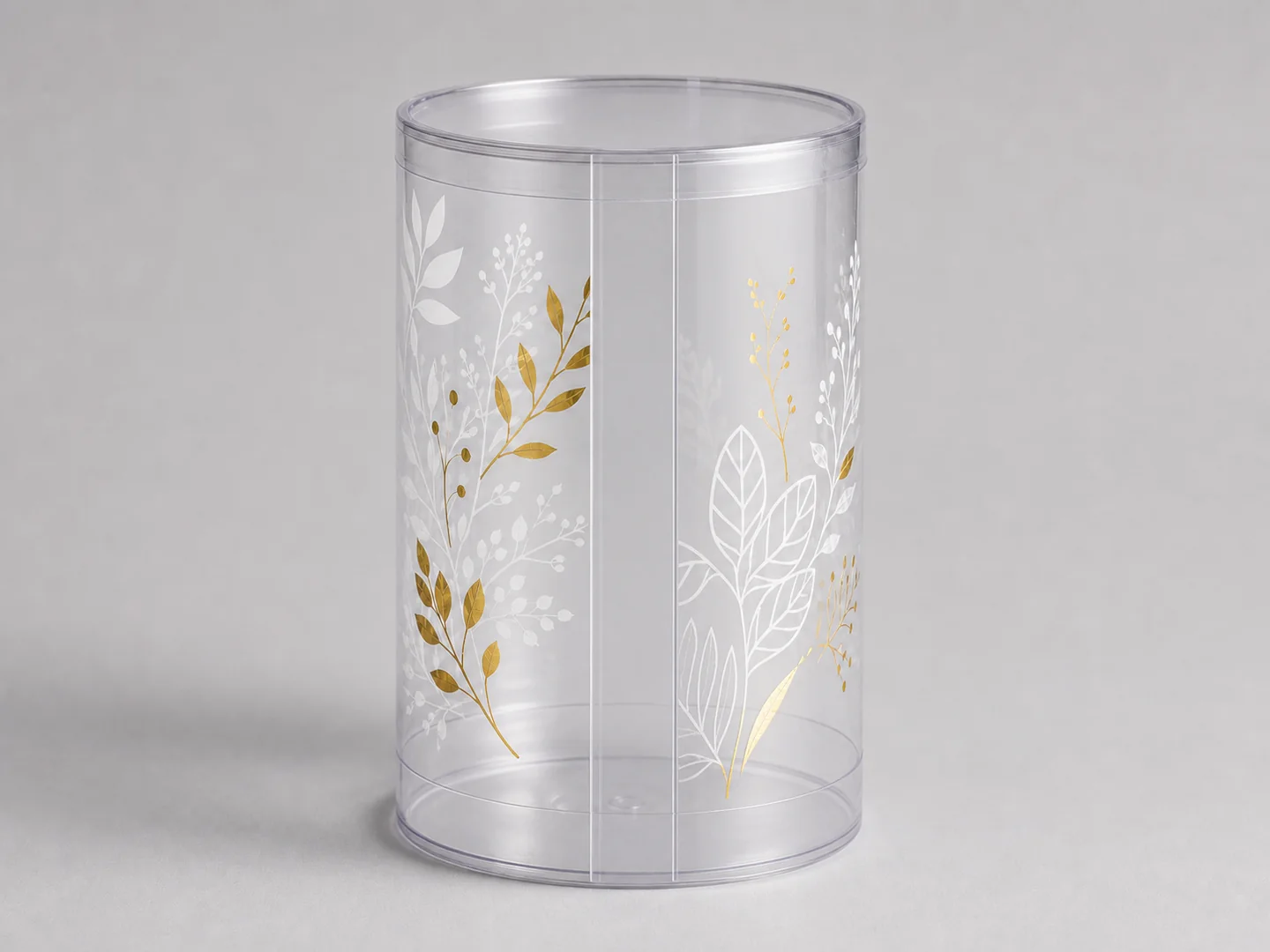 白墨與金色植物圖紋透明圓筒，直向黏邊及底部留白
